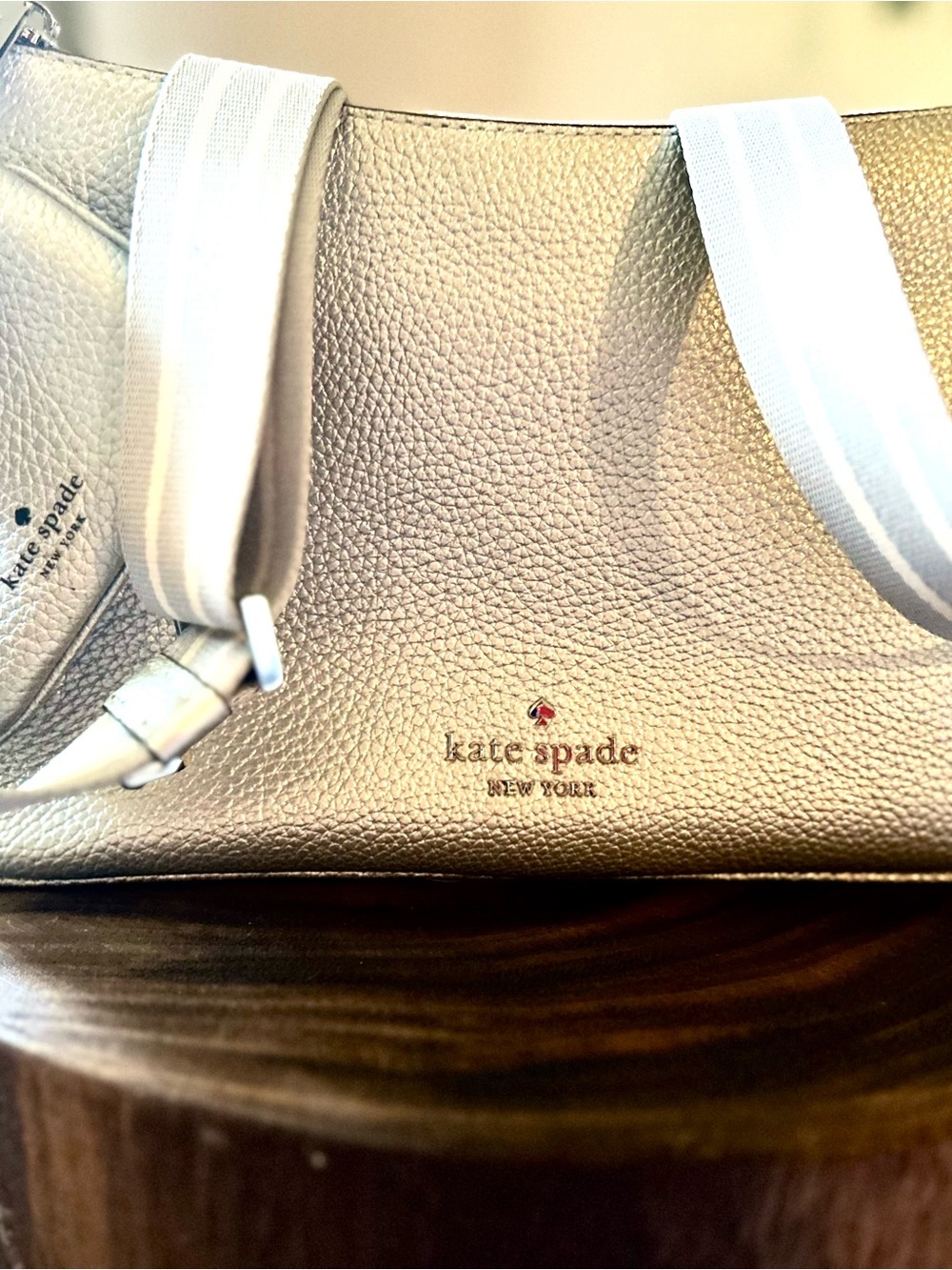kate spade metallic silver pebbled leather shoulder bag with white straps